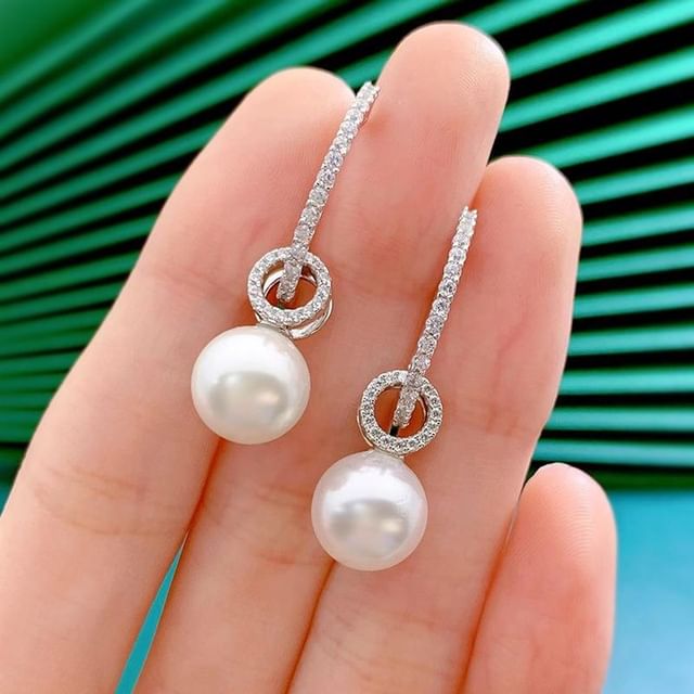 Boucles d'oreilles uniques percées de diamants blancs brillants💎